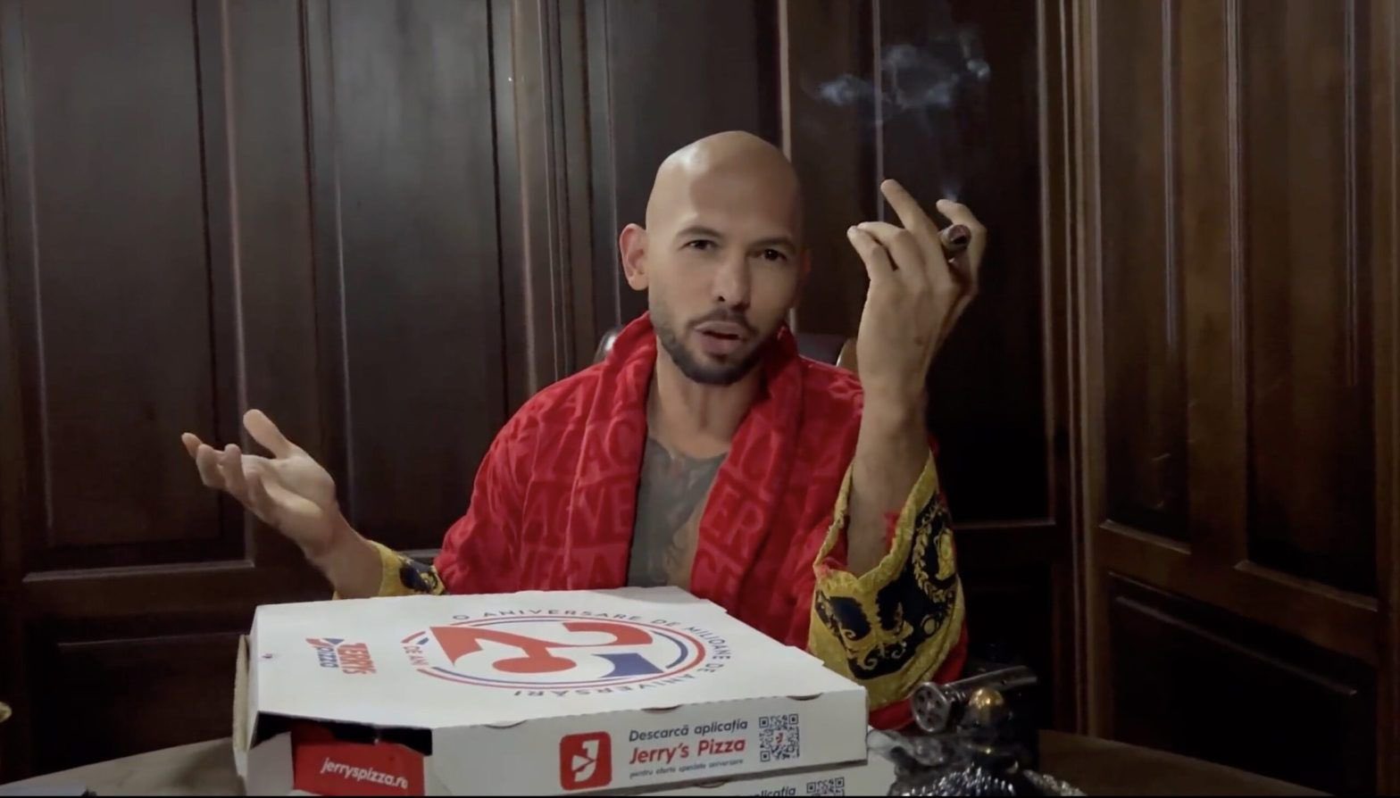 Andrew Tate ujęty przez rumuńską policję dzięki wpadce z pudełkiem pizzy? OPSEC fail? Nie, to fake.